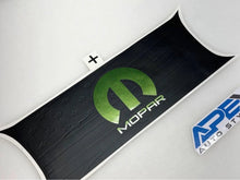 Load image into Gallery viewer, Challenger taillight divider decal with green MOPAR logo on black background, featuring embossed star pattern and curved edges. Product packaging visible in corner.