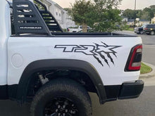 Load image into Gallery viewer, White RAM TRX truck with custom bedside decal featuring TRX logo and claw marks in black, showcasing the product on the vehicle&#39;s side panel