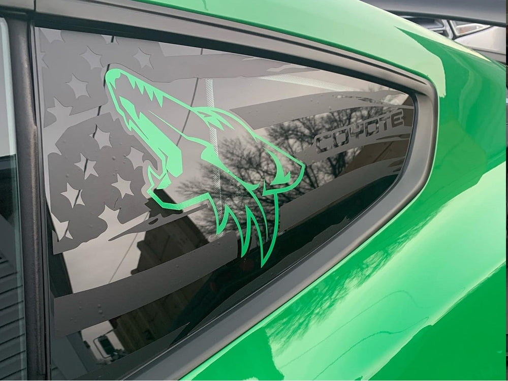 Green Ford Mustang with custom quarter window decal featuring American flag pattern and neon green coyote logo, showcasing unique vinyl design for 2015-2023 S550 models