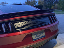 Load image into Gallery viewer, Red Ford Mustang S550 rear view showcasing American flag-inspired decklid decal with Coyote text, custom license plate, and spoiler at dusk