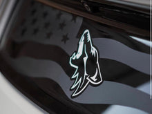 Load image into Gallery viewer, S550 Mustang decklid decal featuring American flag design with cutout stars and stripes, and a teal coyote logo, applied to glossy black car surface, showcasing custom vinyl appearance for 2015-2023 models