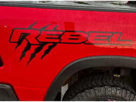 Red RAM Rebel truck with stylish gloss black claw mark logo bedside decals