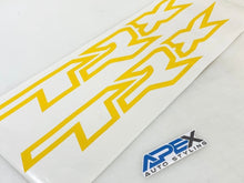Load image into Gallery viewer, Yellow RAM TRX bedside decals with bold, angular design displayed on white background, showcasing OEM style and size. APEX Auto Styling logo visible in corner, demonstrating product authenticity and quality.