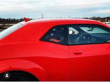 Load image into Gallery viewer, Red Dodge Challenger with custom 392 logo decal on quarter window, showcasing sleek design and performance-inspired styling against a cloudy sky backdrop