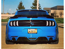 Load image into Gallery viewer, Rear view of a bright blue Ford Mustang S550 model parked outdoors, showcasing its distinctive taillights, decklid, and custom license plate reading &#39;WLDKYOT