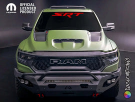 Green RAM truck with SRT logo windshield banner, aggressive front grille, and off-road bumper, showcasing the product decal on a powerful vehicle against a dark background