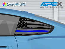 Load image into Gallery viewer, Blue Mustang with custom quarter window decal featuring American flag design with thin blue line, representing police support. Decal fits precisely on car&#39;s window, showcasing patriotic and law enforcement support theme.