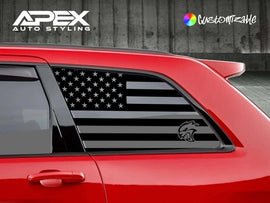 Red Jeep Grand Cherokee with custom black American flag and Hellcat logo decal on quarter window, showcasing Apex Auto Styling product for 2011-2021 models