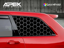 Load image into Gallery viewer, Red Jeep Grand Cherokee with black honeycomb pattern quarter window decals, showcasing custom styling for 2011-2021 models against a concrete background