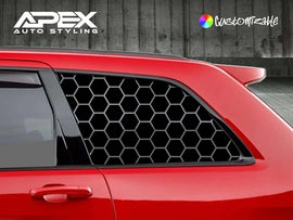 Red Jeep Grand Cherokee with black honeycomb pattern quarter window decals, showcasing custom styling for 2011-2021 models against a concrete background