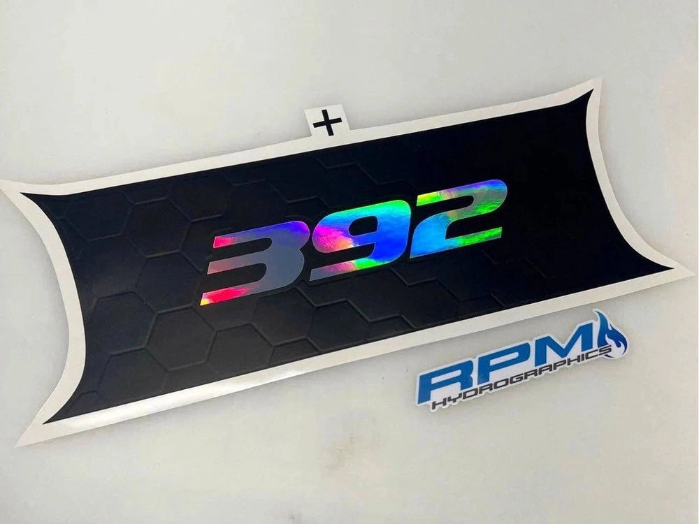 Challenger taillight divider decal featuring iridescent 392 logo on black hexagonal pattern background, with RPM Hydro Graphics branding below