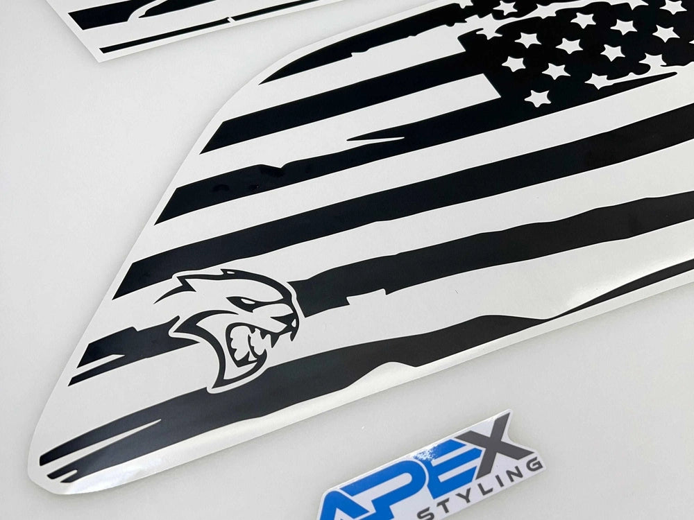 Black and white American flag quarter window decal for Jeep Grand Cherokee with Hellcat logo, featuring distressed stripes and stars design. Apex Styling logo visible in corner.