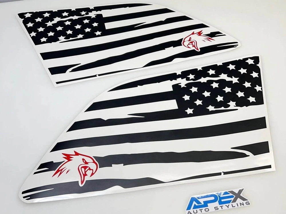 Grand Cherokee quarter window decals featuring distressed American flag design with small hawk logo in black and white, showcasing patriotic style for 2011-2021 models