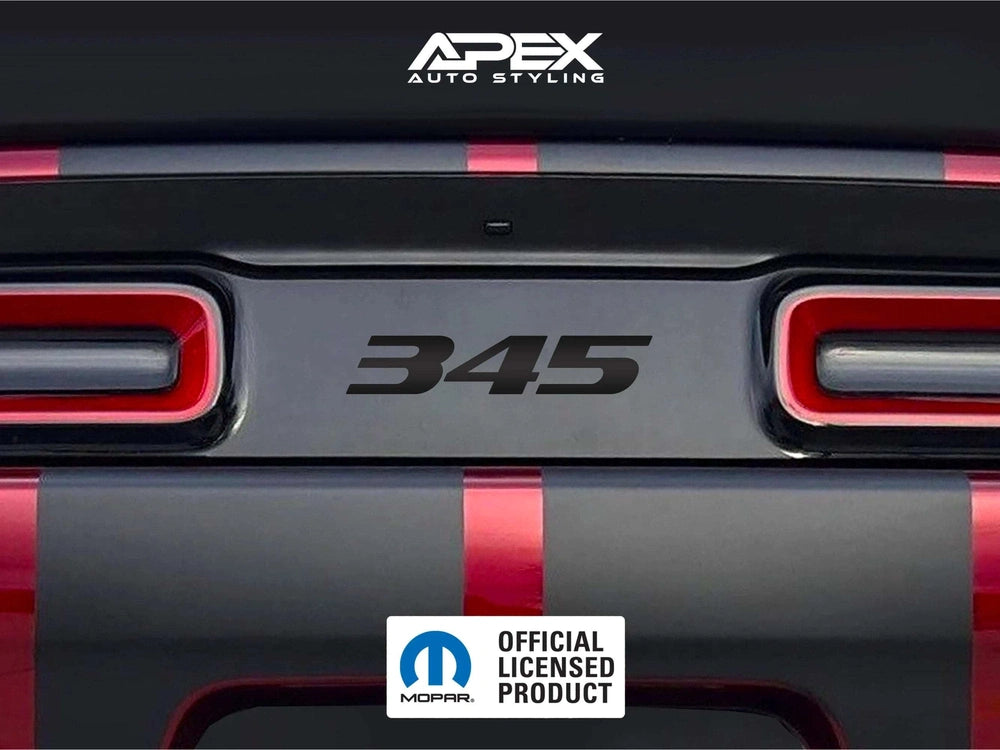 Customizable Challenger taillight divider decal featuring 345 logo, shown on rear of vehicle between red taillights. Black and red color scheme visible, with Apex Auto Styling branding and Mopar licensed product label.