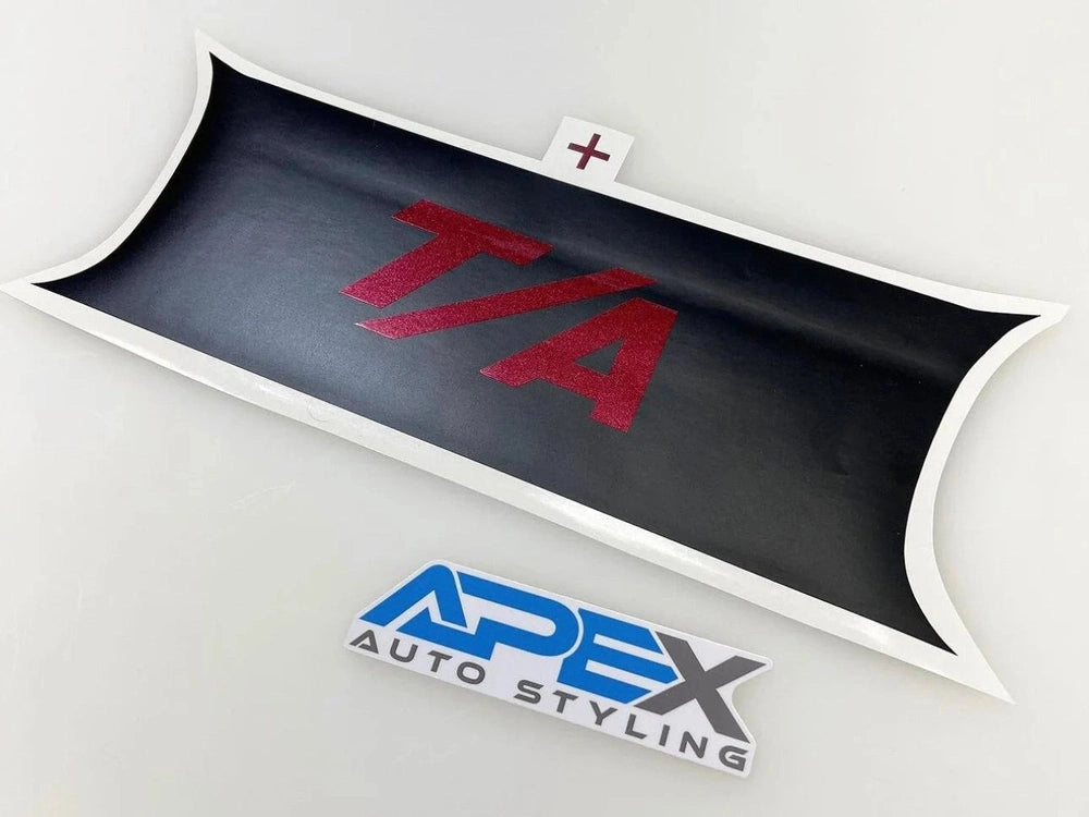 Curved black taillight divider decal with red T/A logo for Dodge Challenger, showcasing Apex Auto Styling branding. Custom vinyl accessory enhances vehicle appearance.