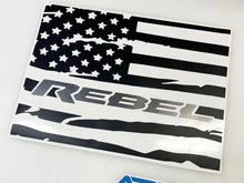 Load image into Gallery viewer, Custom RAM truck rear window decal featuring distressed American flag design with Rebel logo, precision-cut in black and white vinyl for 2009+ models, offering unique patriotic styling