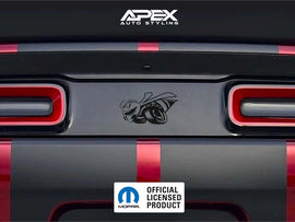 Dodge Challenger taillight divider with customizable 1320 Superbee logo decal, shown in matte black with embossed design between red taillights, official licensed Mopar product by Apex Auto Styling