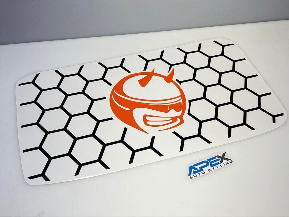 Dodge Challenger Demon Bee sunroof decal featuring orange logo on white background with black honeycomb pattern, showcasing product design and installation example