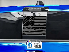 RAM truck rear sliding window with black American flag decal featuring SRT logo, shown on blue vehicle exterior with official licensed product sticker