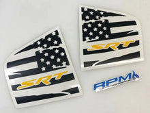 Load image into Gallery viewer, Custom quarter window decals for Dodge Charger featuring American flag design with SRT logo in yellow. Two triangular decals shown with black and white stars and stripes pattern. RPM logo in blue visible below.