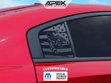 Load image into Gallery viewer, Red Dodge Charger with custom Angry Hornet logo decal on quarter window. Decal features matte black background with American flag pattern and hornet mascot. Apex Auto Styling logo visible. Car exterior showcases sleek design and personalized styling.