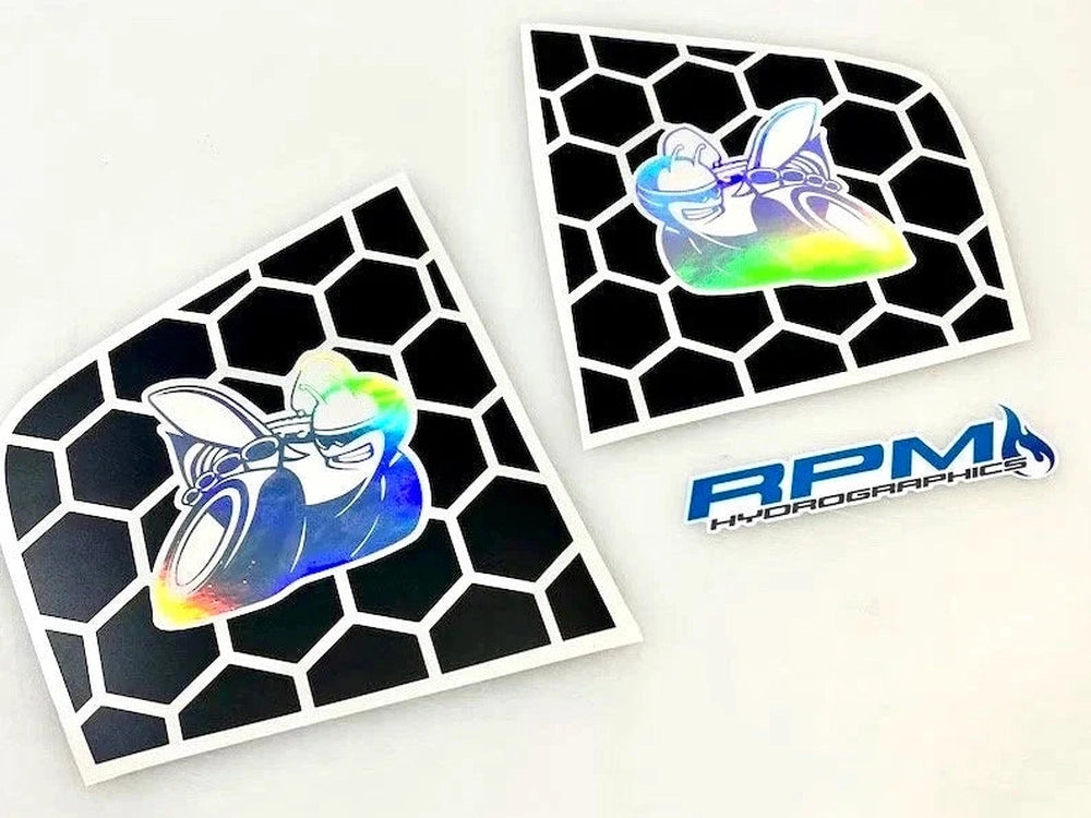 Dodge Charger quarter window decals with Scat Pack logo on hexagonal pattern background, showcasing holographic bee design and RPM Autographics branding