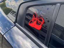 Load image into Gallery viewer, Dodge Charger quarter window with red Scat Pack logo decal on black background, reflecting sky and surroundings, showcasing custom vinyl application for 2011-2023 models