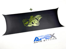Load image into Gallery viewer, Customizable Challenger taillight divider decal featuring green 1320 Superbee logo on matte black background, displayed above Apex Auto Styling logo, showcasing product design and branding.