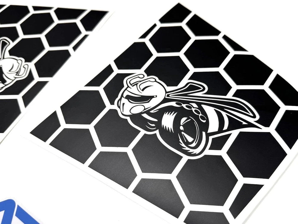 Custom Dodge Charger quarter window decals featuring Superbee logo on black honeycomb pattern background, showcasing precision-cut vinyl design for 2011-2023 models