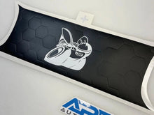 Load image into Gallery viewer, Challenger taillight divider decal featuring Scat Pack bee logo on black honeycomb background. White border frames the custom vinyl accessory designed to enhance and protect the vehicle&#39;s appearance.