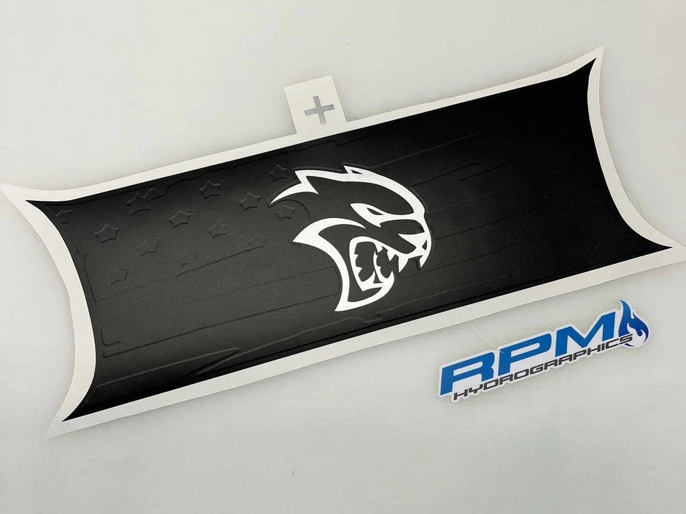 Challenger taillight divider decal featuring Hellcat logo in white on black background, with embossed star pattern and RPM Hydroprinting logo below