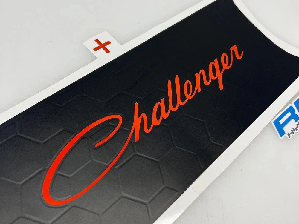 Challenger taillight divider decal with orange text logo on black hexagonal pattern background, showcasing customizable design for Dodge Challenger vehicles