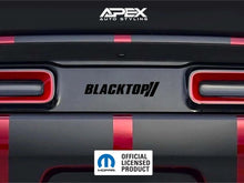 Load image into Gallery viewer, Dodge Challenger rear view with Blacktop logo taillight divider decal, showcasing custom design between red taillights. APEX Auto Styling and Mopar Official Licensed Product logos visible.