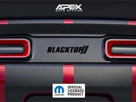 Dodge Challenger rear view with Blacktop logo taillight divider decal, showcasing custom design between red taillights. APEX Auto Styling and Mopar Official Licensed Product logos visible.