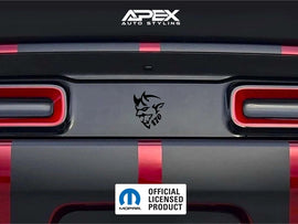Dodge Challenger taillight divider with Demon 170 logo decal, showcasing customizable design options for car enthusiasts. Black vinyl decal between red taillights on gray vehicle rear.