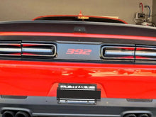 Load image into Gallery viewer, Red Dodge Challenger rear view with taillight divider featuring 392 logo, showcasing customizable decal option for Challenger taillight area