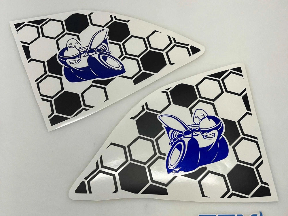 Challenger quarter window decals featuring blue Scat Pack bee logo on honeycomb pattern background. Two triangular vinyl stickers displayed, ready for application on vehicle windows.
