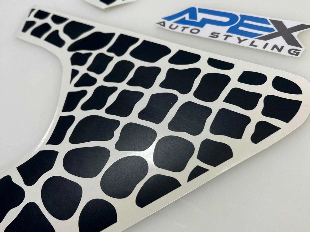 Custom alligator scales fender vent decal for Jeep Wrangler and Gladiator, showcasing intricate cutout pattern on white background with Apex Auto Styling logo visible