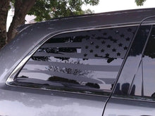 Load image into Gallery viewer, Jeep Grand Cherokee with American flag decal applied to rear quarter window, showcasing patriotic design and custom appearance for 2011-2021 models