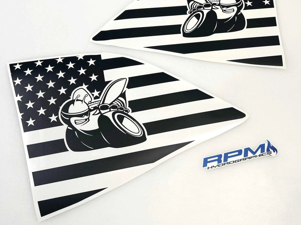 Black and white American flag-themed quarter window decals for Dodge Challenger, featuring Scat Pack bee logo design. Custom vinyl stickers for car customization, shown with RPM logo.