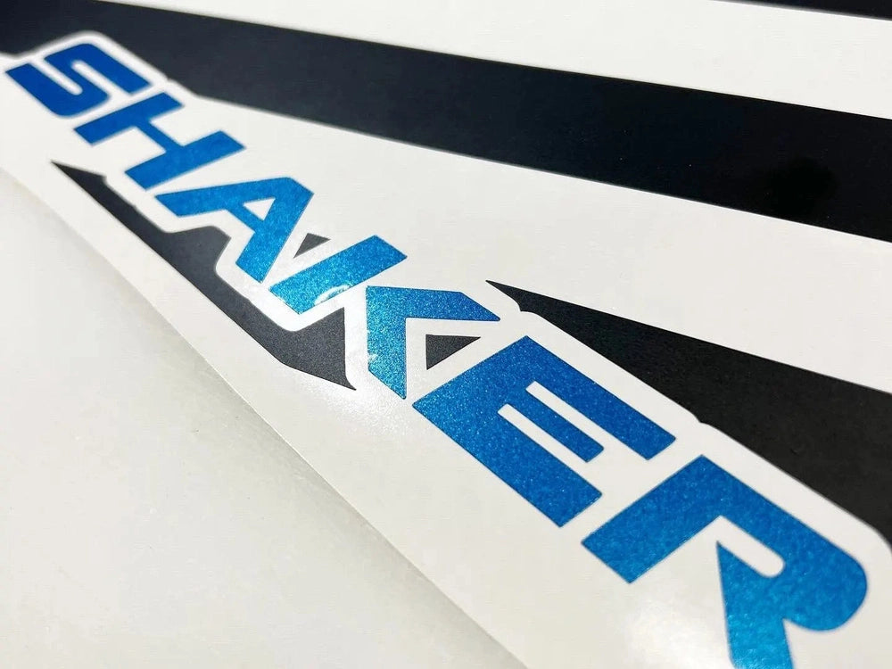 Dodge Challenger quarter window decal with blue gradient 'SHAKER' logo on white background, showcasing custom vinyl graphic design for vehicle customization