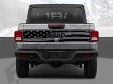 Load image into Gallery viewer, Rear view of a 2020+ Jeep Gladiator with an American flag tailgate decal, showcasing the patriotic design and custom look on the silver-gray truck body, emphasizing the unique vinyl application for Jeep enthusiasts.