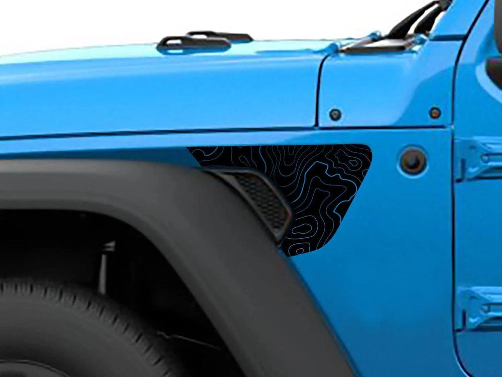 Topographic map fender vent decal on bright blue Jeep Wrangler or Gladiator, showcasing precise fit and custom design for 2018-2022 models, enhancing vehicle appearance with unique black contour pattern
