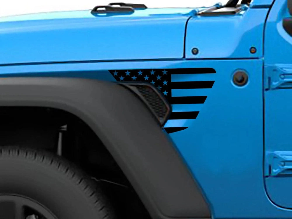 Blue Jeep Wrangler fender with American flag decal, showcasing patriotic custom vinyl accent for Gladiator and Wrangler models, enhancing vehicle appearance with precision-cut design
