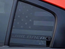 Load image into Gallery viewer, Charger quarter window decal featuring American flag design with &quot;Jailbreak&quot; text, applied to a red vehicle&#39;s rear side window, showcasing custom vinyl graphics for Dodge Charger models