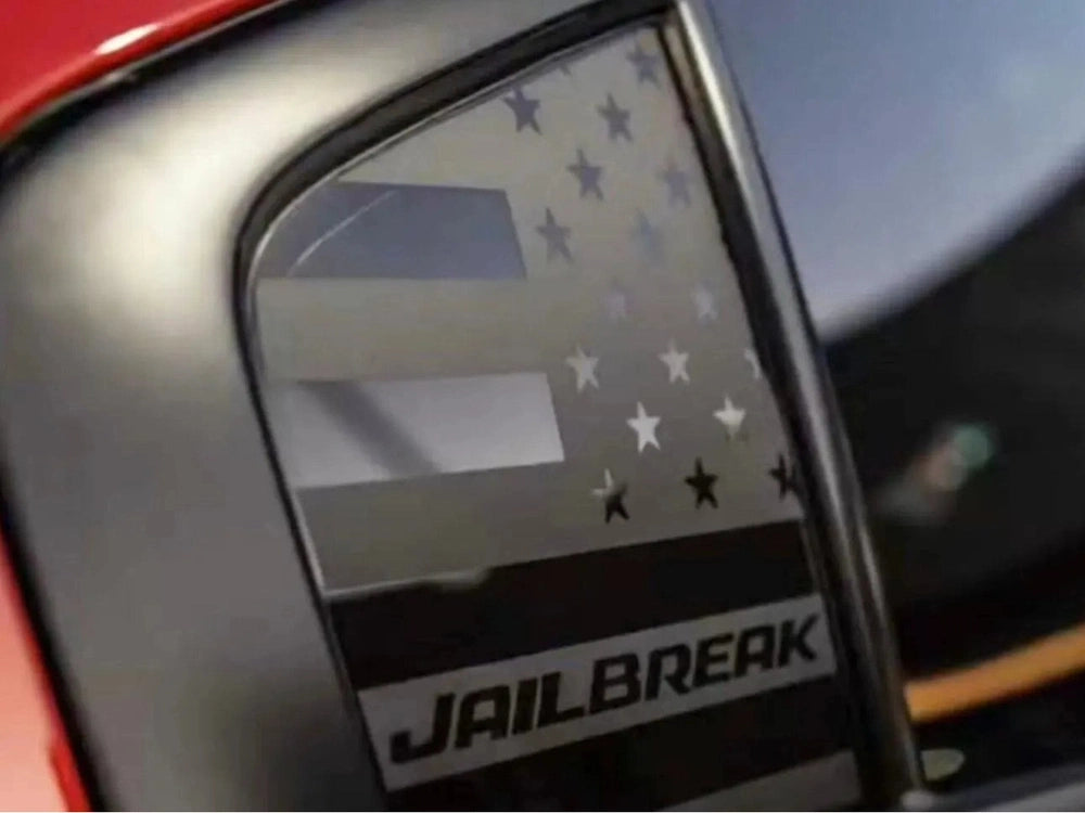 Dodge Charger quarter window with custom Jailbreak decal featuring American flag design and text, showcasing unique vinyl application for 2011-2023 models
