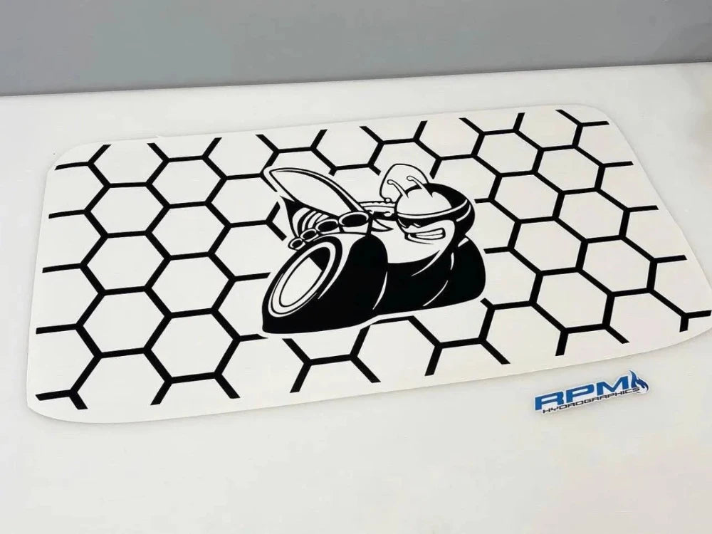 Matte black Challenger scat pack logo sunroof decal with honeycomb background