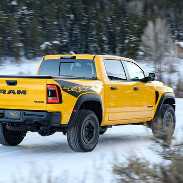 Yellow RAM TRX Havoc Edition with matte black bedside graphics.
